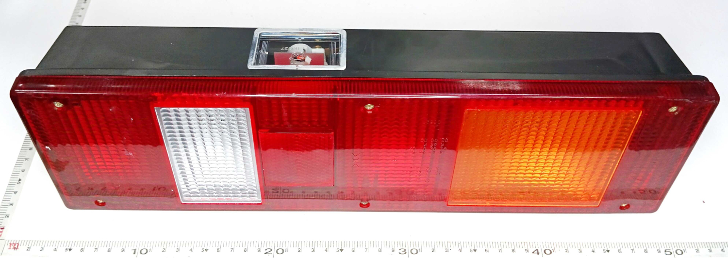 Фонарь задний МАЗ круглый разьем левый