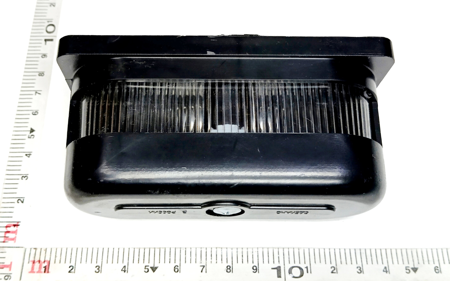 Фонарь подсветки номера пластик