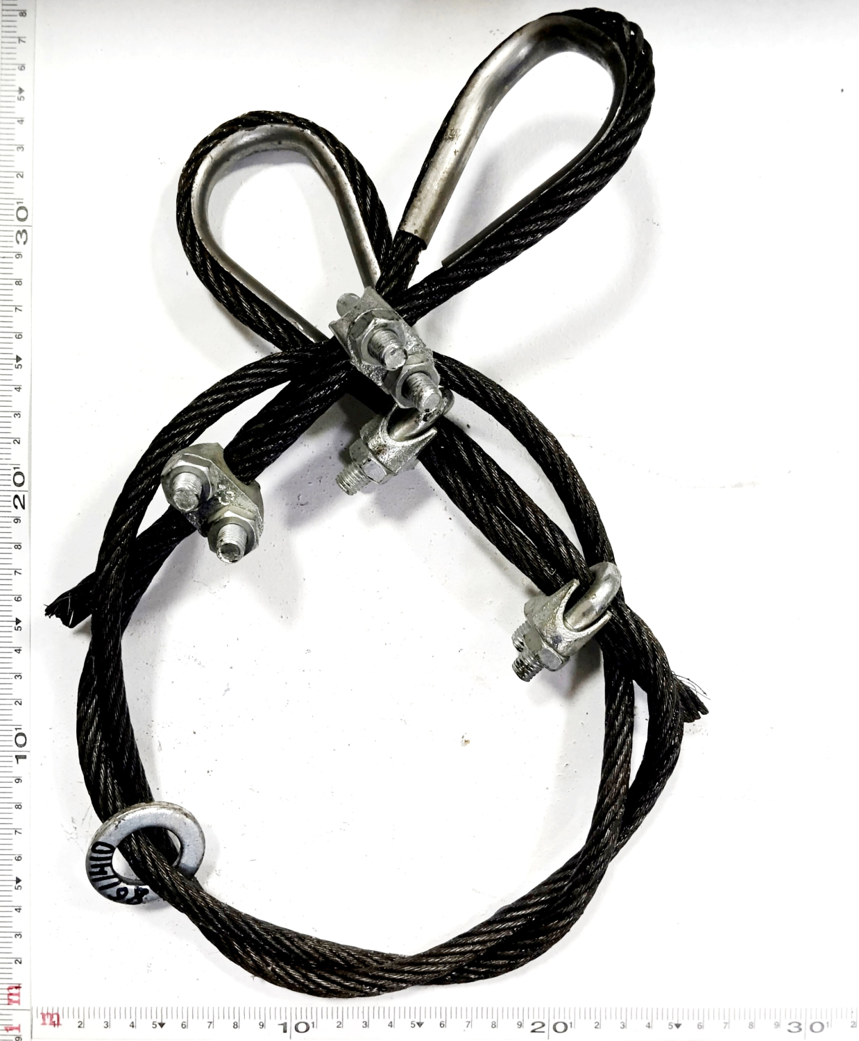 Трос ограничения подьема кузова